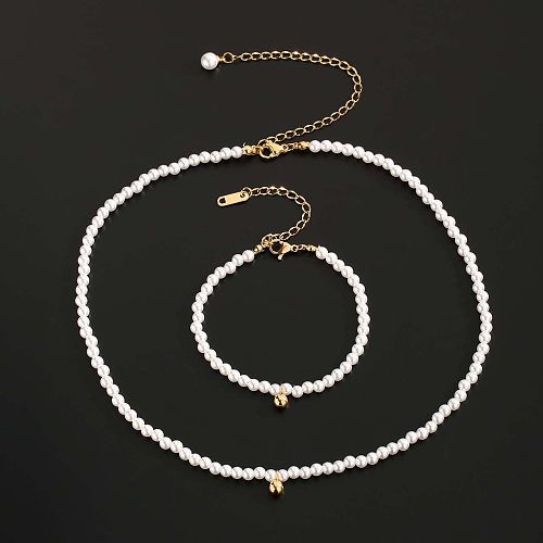Schlichter Stil, runde künstliche Perle, Titan-Stahlbeschichtung, vergoldete Armbänder, Halskette
