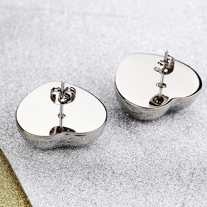Conjunto de joyería de acero de titanio con incrustaciones de acero de titanio en forma de corazón de moda