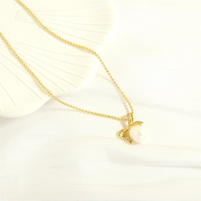 Elegant Simple Style Bow Knot Freshwater Pearl Copper Plating Inlay Zircon 18K Gold Plated Pendant Necklace