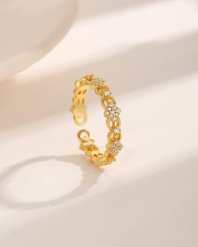Estilo moderno estilo simples redondo chapeamento de cobre oco embutimento zircão 18K anéis abertos banhados a ouro