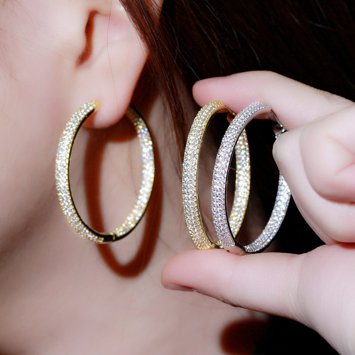 1 Paar übertriebene, übergroße, runde Ohrringe mit Kupfer-Zirkon-Intarsien, rhodiniert und versilbert