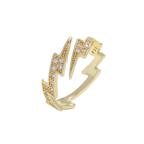 Modischer Ring aus symmetrischem Blitzgold mit eingelegtem Zirkon und Kupfer
