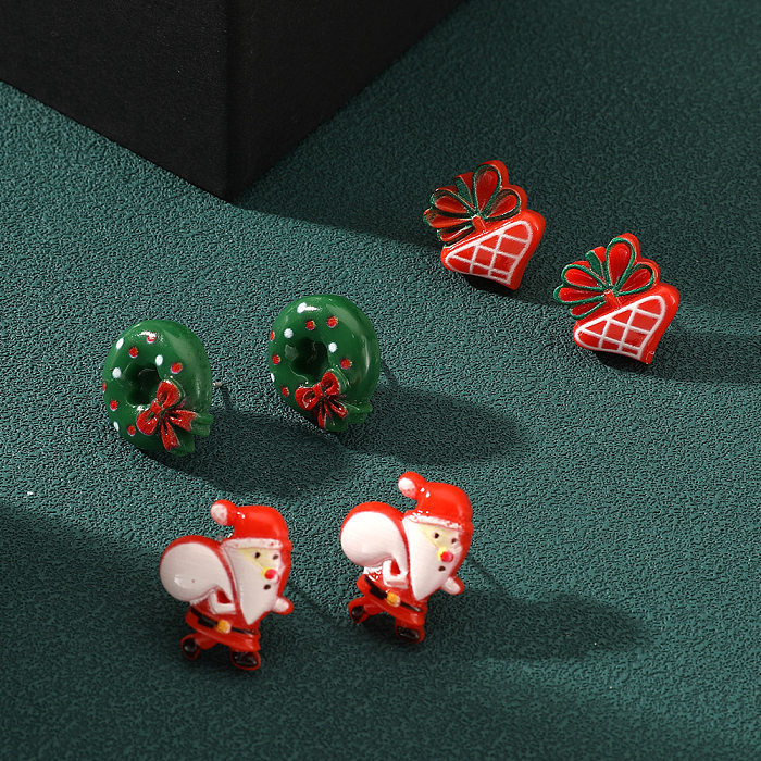 1 Paar süße süße Weihnachtsbaum-Weihnachtsmann-Elch-Ohrstecker aus Kupfer