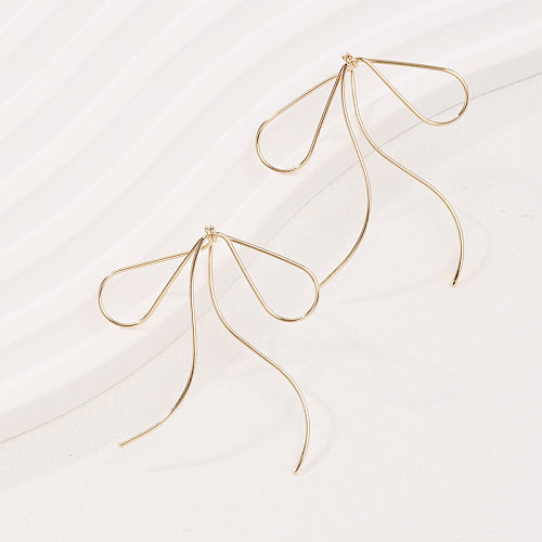 1 paire de boucles d'oreilles pendantes en cuivre plaqué or, Style Simple, nœud papillon