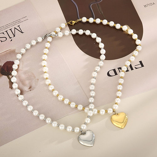 Collar de pulseras con revestimiento de perlas y cuentas de acero titanio en forma de corazón a la moda