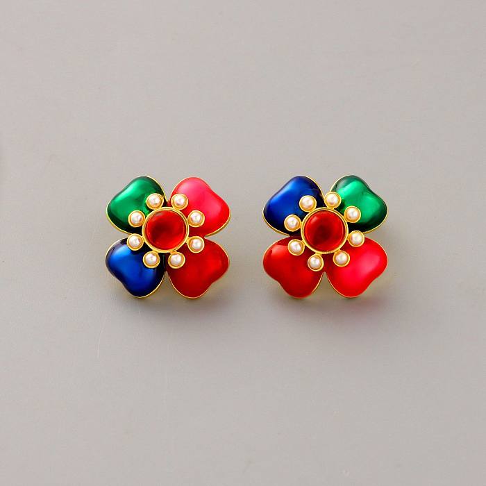 1 paire de clous d'oreilles en perles de cuivre avec incrustation de fleurs de style classique