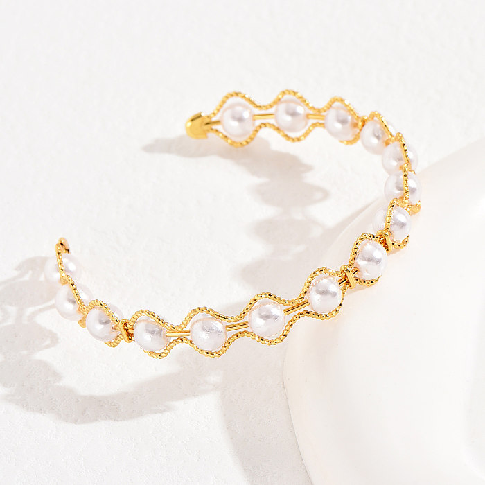 Estilo simple Forma de corazón Ojo Chapado en cobre Perlas artificiales Brazalete de circón 1 pieza