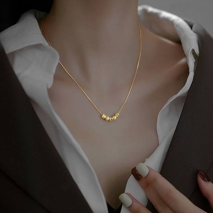 Elegante geometrische Halskette aus Titanstahl mit Kupferbeschichtung