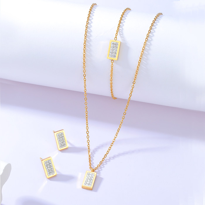 Modisches, einfaches, rechteckiges, eingelegtes Zirkon-Edelstahl-Ohrstecker-Armband-Halsketten-Set