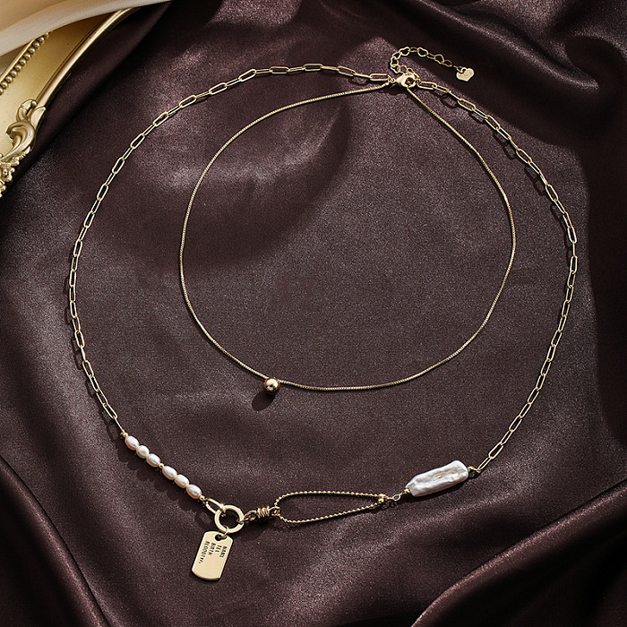 Collier pendentif en plaqué argent avec nœud papillon de style baroque, incrustation de perles d'eau douce, plaqué or 18 carats