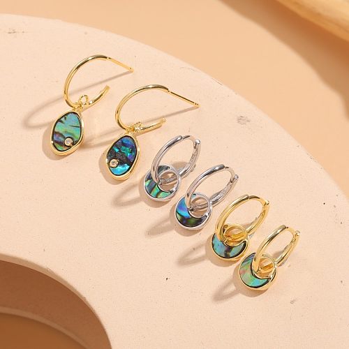 1 Paar elegante, klassische, geometrische, asymmetrische, plattierte Ohrringe aus Kupfer mit Zirkon und 14-Karat-Vergoldung