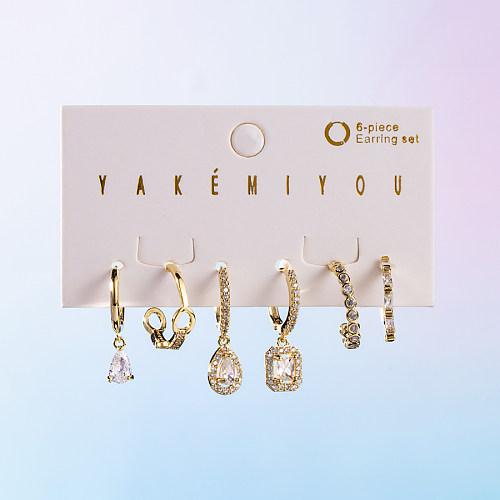 Yakemiyou doux trèfle à quatre feuilles oeil du diable forme de coeur cuivre asymétrique coquille Zircon 14K boucles d'oreilles plaquées or