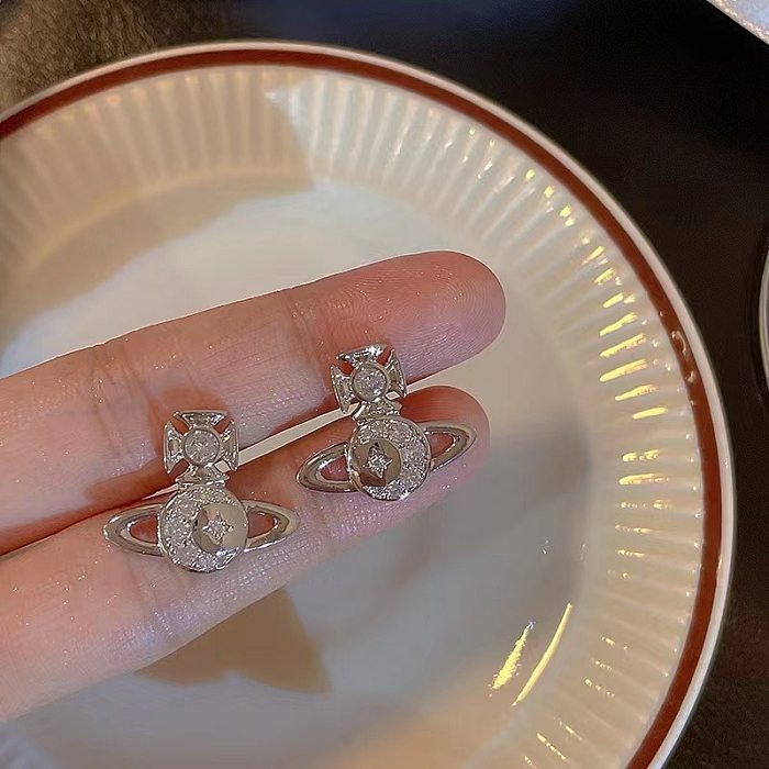 1 Paar schlichte Ohrringe mit Planet-Inlay aus Kupfer und Zirkon