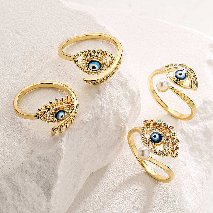 Modischer offener Ring mit Teufelsauge, Kupfer, vergoldet, künstliche Perlen und Zirkon