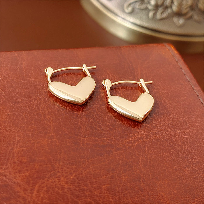 1 paire de boucles d'oreilles en cuivre plaqué en forme de cœur, Style Simple et décontracté