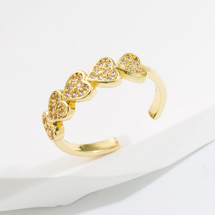 Modischer offener Ring in Herzform aus Kupfer mit vergoldetem Zirkon, 1 Stück