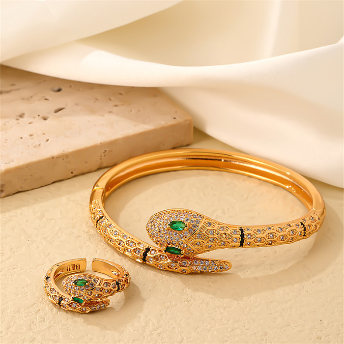 Conjunto de joyería chapado en oro con incrustaciones de cobre y circonitas Glam Snake