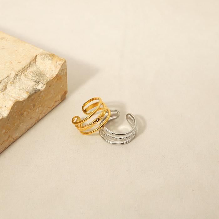Anillo abierto chapado en oro de titanio de 18 quilates con revestimiento de acero de color sólido de estilo simple