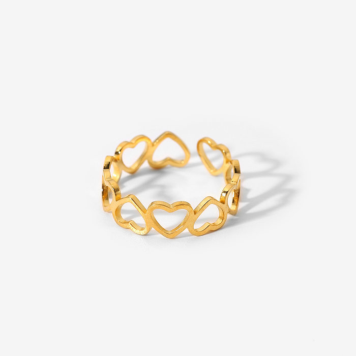 Einfacher, hohler, gespleißter Herz-Ring aus vergoldetem Edelstahl. Großhandelsschmuck