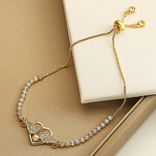 Simple Style Infinity Heart Shape Wings Copper Plating Inlay Artificial Pearls Zircon 18K Gold Plated Bracelets