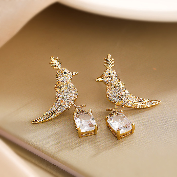 1 par de elegantes pendientes colgantes chapados en oro de 18K con incrustaciones de pájaros y vacaciones para mujer