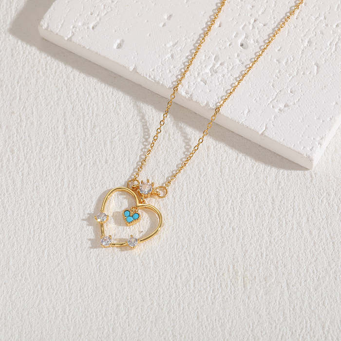 Elegante estilo clássico formato de coração revestimento de cobre incrustado zircão colar com pingente banhado a ouro 14K