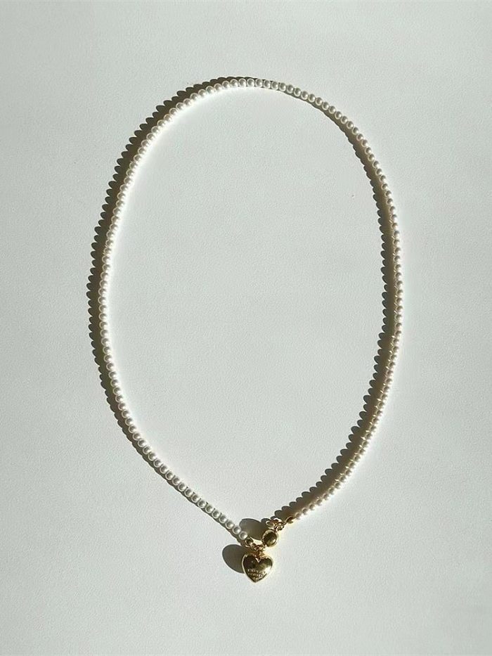 Collier pendentif élégant en forme de cœur pour femme, Imitation perle, placage de cuivre