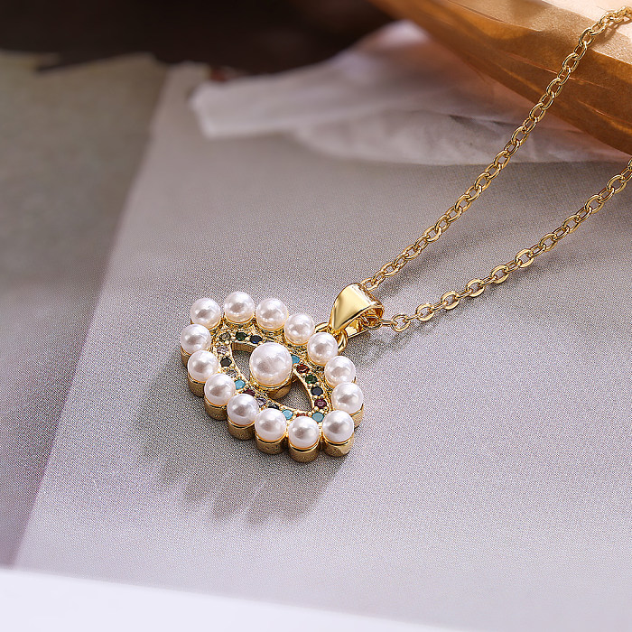 Retro Schlichter Stil Teufelsauge Kupferbeschichtung Inlay Künstliche Perlen Zirkon 18K vergoldet Anhänger Halskette