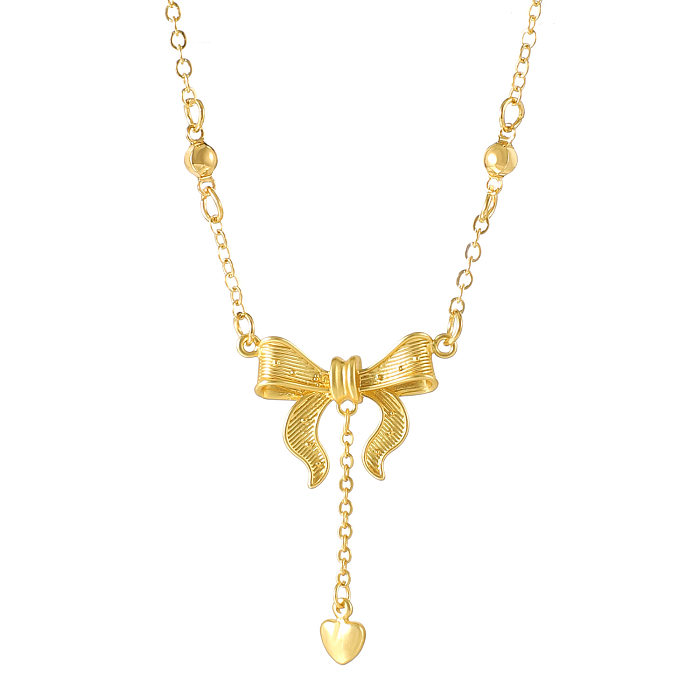 Collar con colgante chapado en oro de 18 quilates con nudo de lazo en forma de corazón de princesa estilo IG