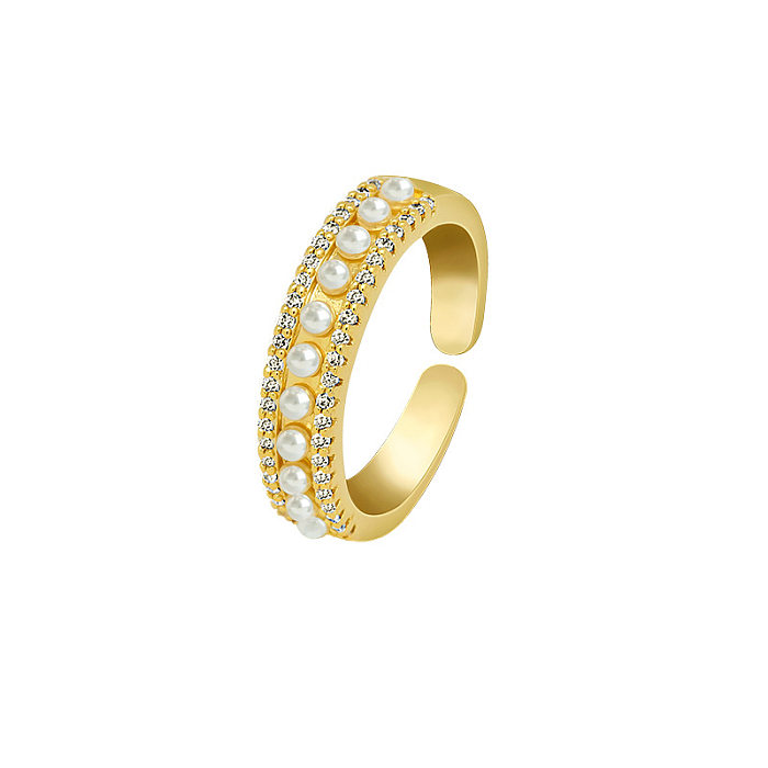 Einfacher, runder offener Ring mit Kupferbeschichtung und Inlay aus Perlen und Zirkon