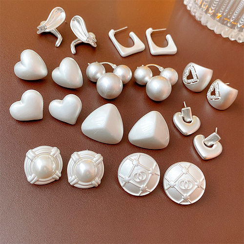 1 paire de clous d'oreilles ajourés en forme de cœur, Style Simple, plaqué cuivre
