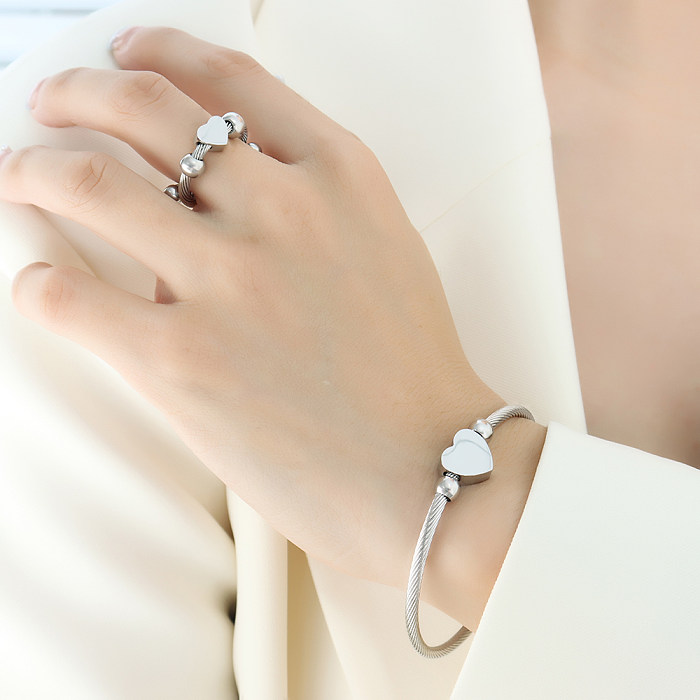 Bracelets à anneaux plaqués or 18 carats, en forme de cœur élégant, en acier titane, vente en gros