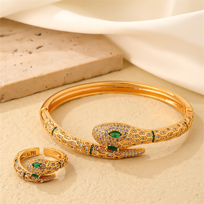 Conjunto de joyería chapado en oro con incrustaciones de cobre y circonitas Glam Snake