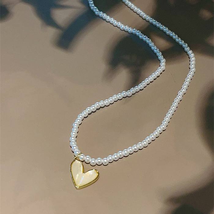 High-Grade Natural Heart Shell Pearl Chain Fritillary Stud Earrings Fresh Set Simple Refined Grace Ornament