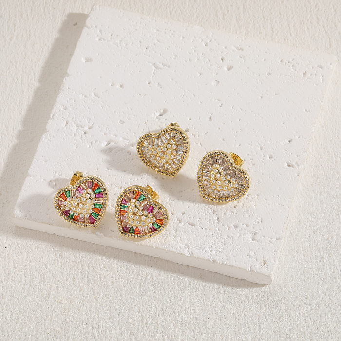 1 par de pendientes chapados en oro de 14 quilates con incrustaciones asimétricas en forma de corazón de estilo clásico con circonita perla de cobre