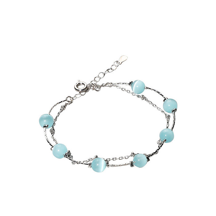 Bracelets ronds en opale de pierre de lune avec incrustation de cuivre