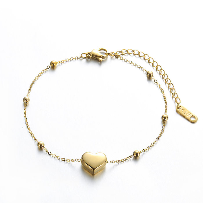 Collier de bracelets plaqué or 18 carats en acier titane en forme de cœur de style simple et décontracté