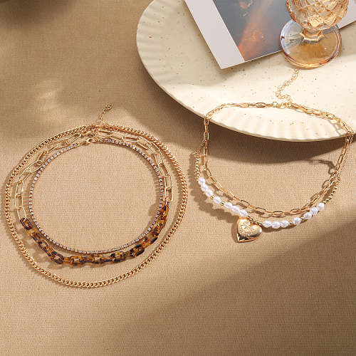 Colliers superposés en forme de cœur rétro, perle artificielle, résine, placage de cuivre, incrustation de Zircon, plaqué or 14 carats