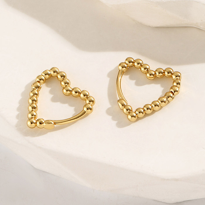 1 par de brincos banhados a ouro 18K em estilo simples e doce em formato de coração
