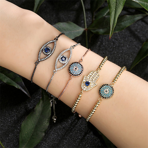Luxuriöse Commute-Eye-Kupfer-Perlen-Inlay-Zirkon-Armbänder im klassischen Stil