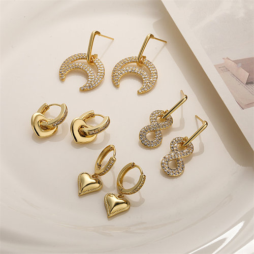 1 par de pendientes elegantes chapados en forma de corazón con incrustaciones de cobre y circonita chapados en oro