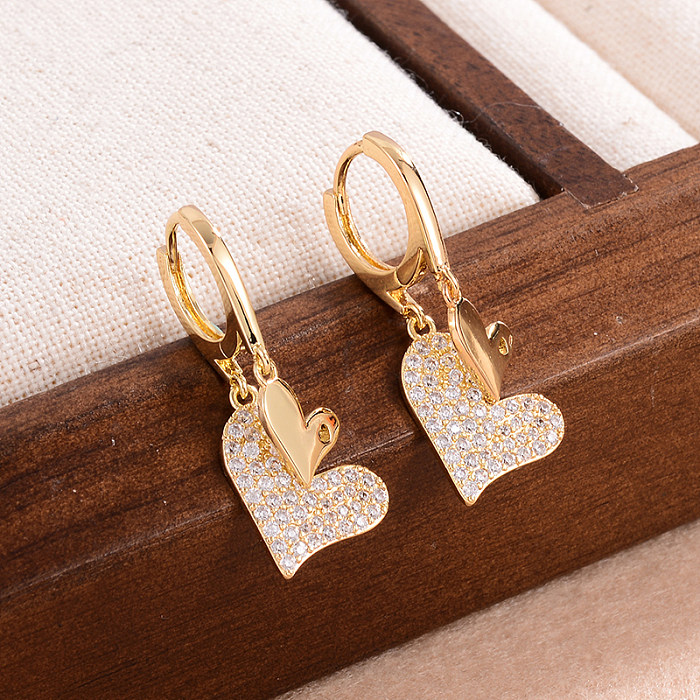 1 par IG estilo elegante estilo francês formato de coração chapeamento incrustado de cobre zircão brincos banhados a ouro 14K