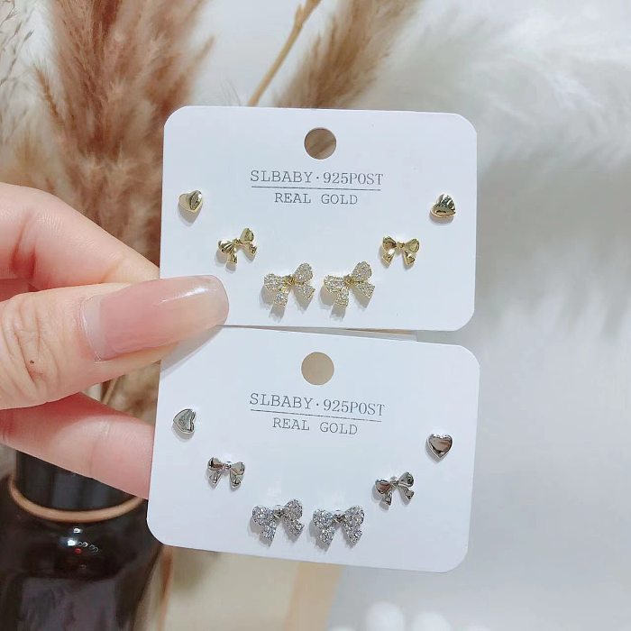 Simple Style Geometric Heart Shape Bow Knot Copper Plating Inlay Artificial Gemstones Ear Studs