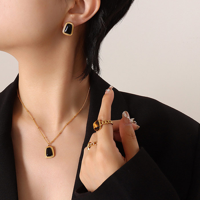 Collier de boucles d'oreilles opale en acier titane géométrique de style français