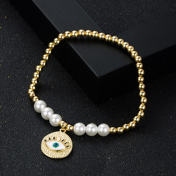 Fashion New Copper Gold-plated Oil Devil's Eye Bracelet Copper Beads Pearl Elastic Bracelet