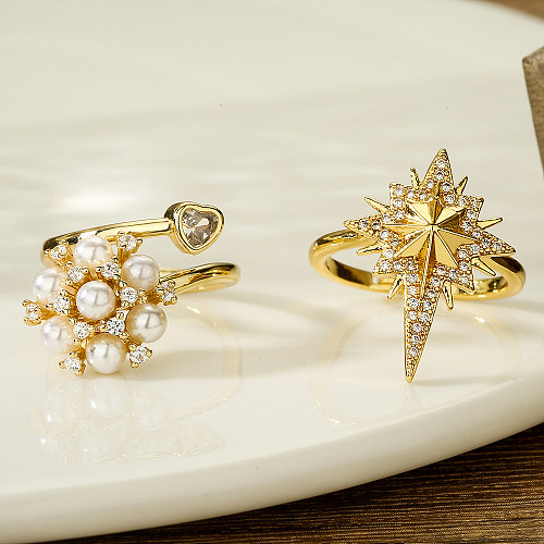 Eleganter, glamouröser offener Ring mit Sternblume, Kupferbeschichtung, Inlay, künstlichen Perlen und Zirkon, 18 Karat vergoldet