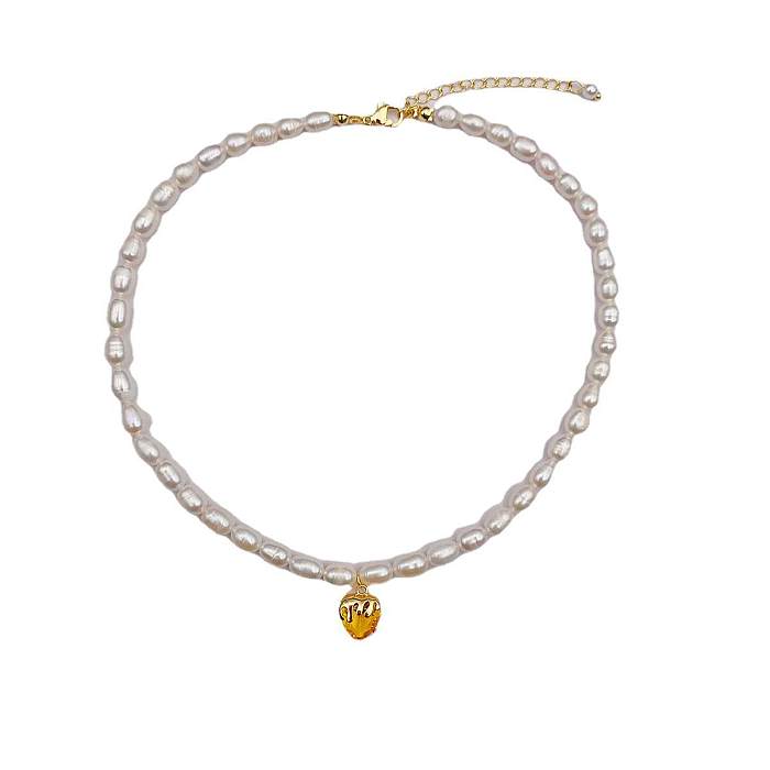 Collier pendentif en Zircon avec incrustation de perles en cuivre en forme de cœur de Style Simple