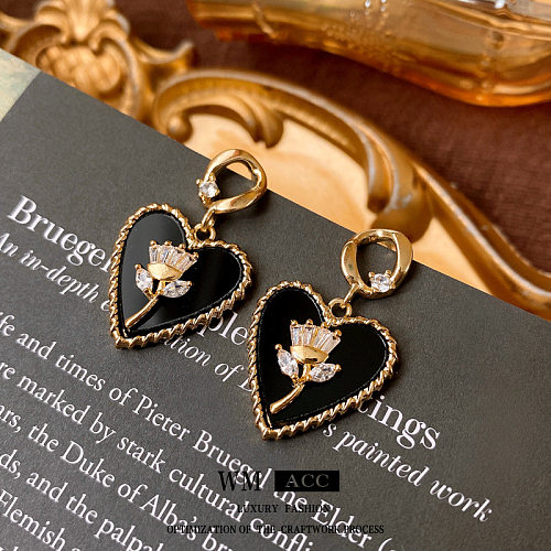 1 paire de boucles d'oreilles pendantes en cuivre et émail en forme de cœur