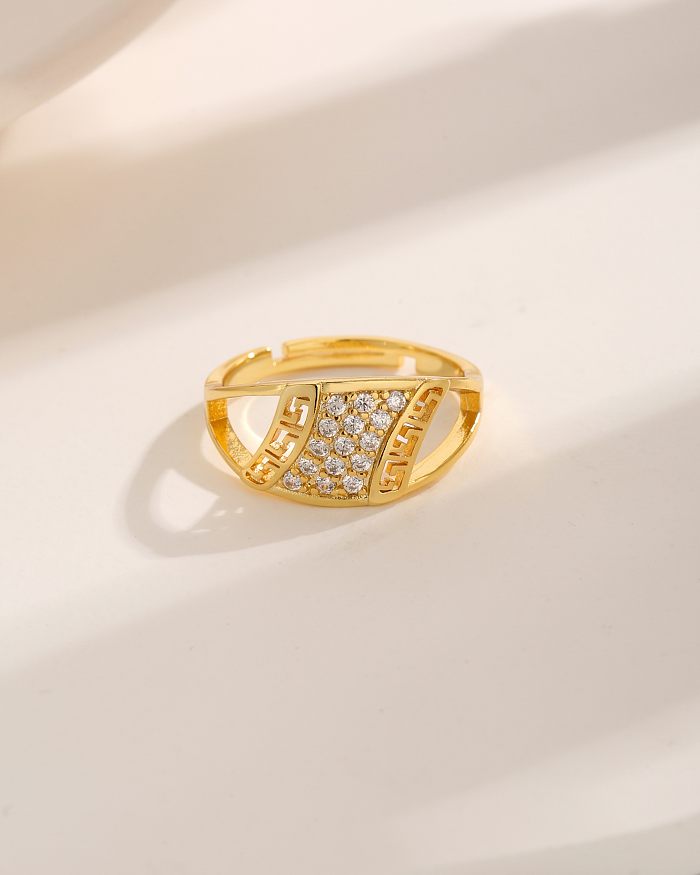 Estilo simples comutar chapeamento de cobre quadrilátero oco para fora anéis banhados a ouro de zircão 18K