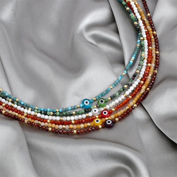 Bohemian Simple Style Eye Künstliche Edelsteine ​​Kupfer 18K vergoldete Halskette in großen Mengen